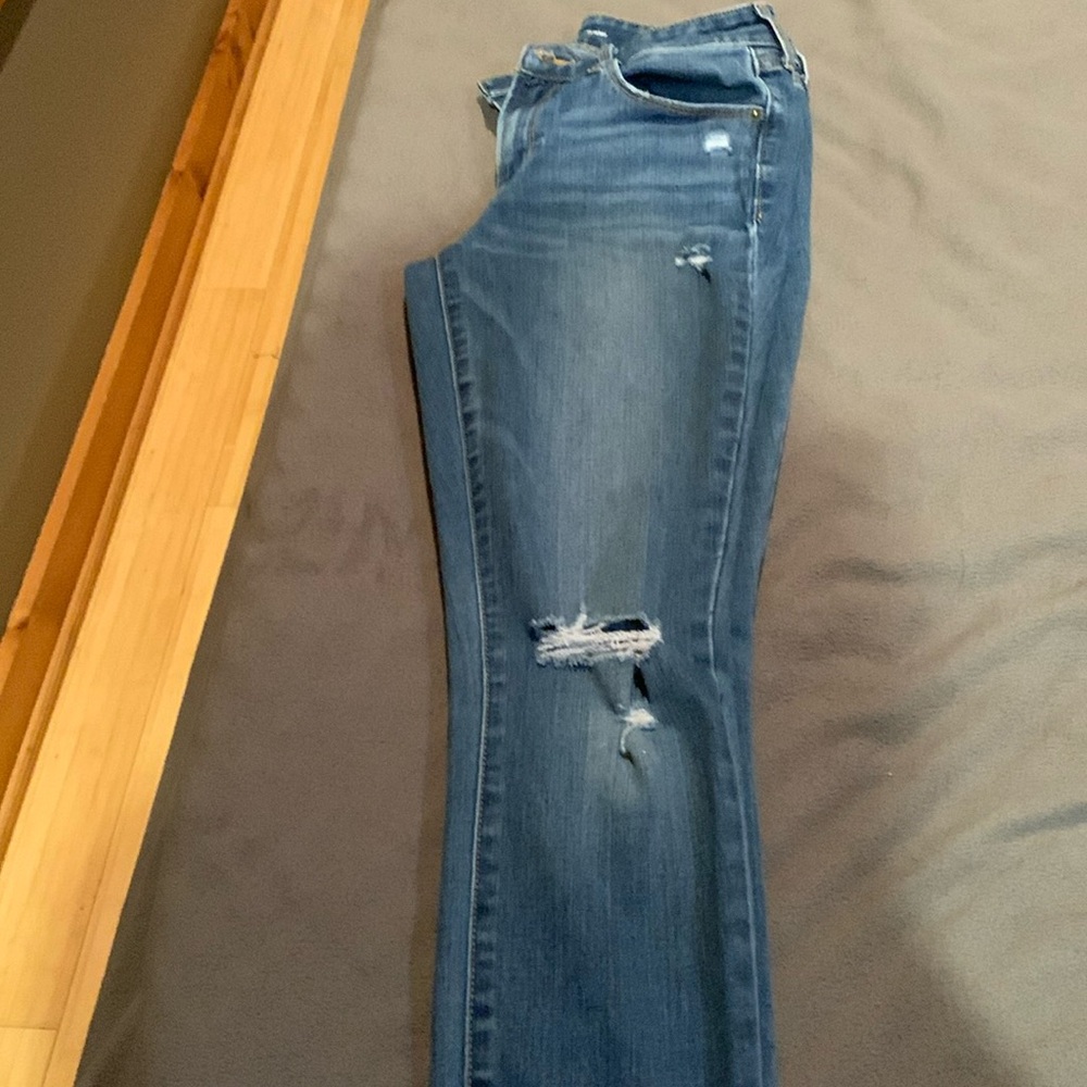 Women’s mid rise distressed jeans